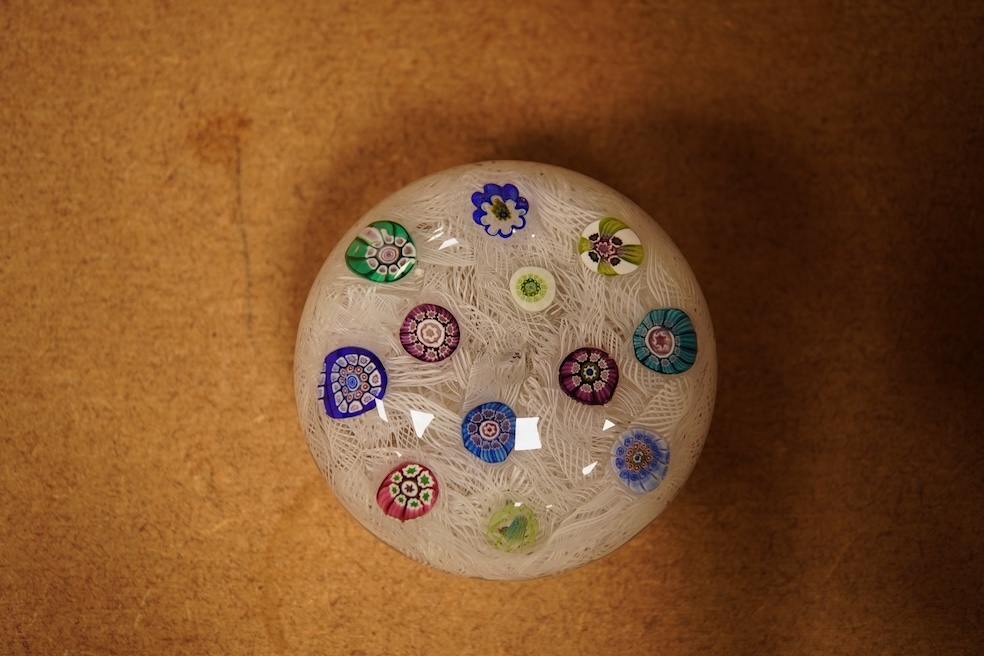 A Perthshire millefiori paperweight, 6.5cm in diameter, together with related Sotheby’s catalogues